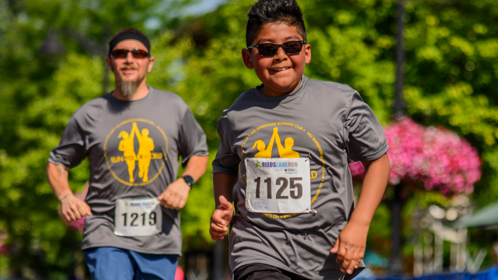 two young men running race
