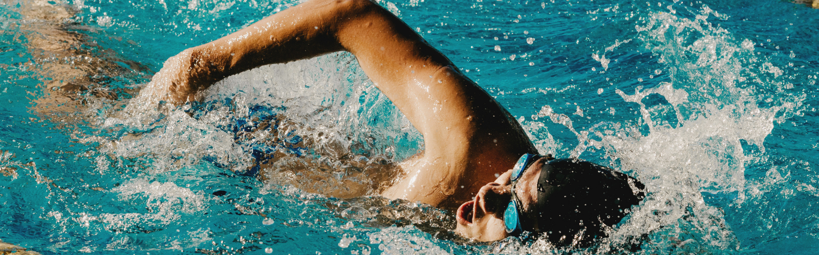 person swimming in pool